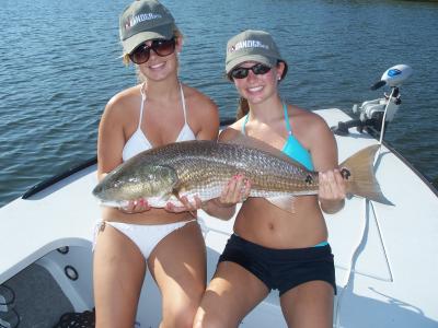 Lyndsey and Emily witrh a nice redfish.